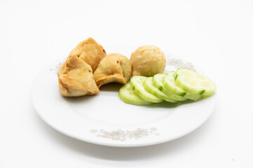 Crispy deep fried Singaras isolated on white background