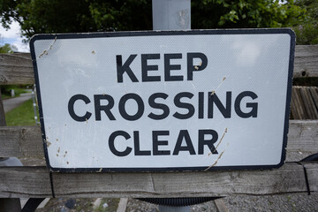 Keep crossing clear sign at Bolton Abbey railway station, Yorkshire, UK