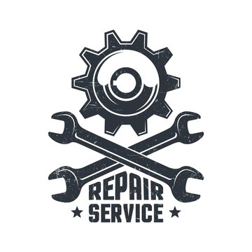 Mechanical repair workshop - retro logo with gear and wrenches. Spanner and gear wheel - vintage emblem.