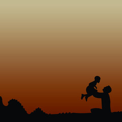 silhouettes of father and little son playing at sunset