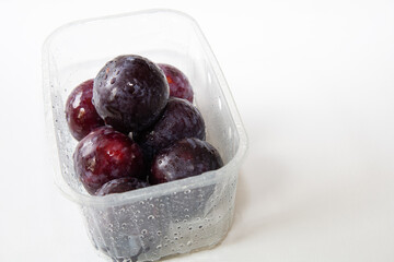 Fresh plum fruit isolated on white background