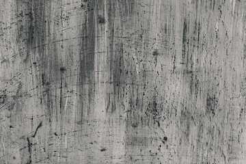 Grunge abstract beautiful monochrome black and gray wall with cracks and splashed black paint on plaster. Background with space for text or image. The art of rough stylized texture.