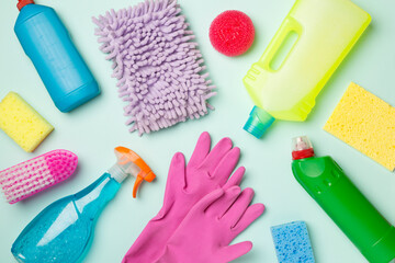 Many different house cleaning products on color background, top view - Powered by Adobe