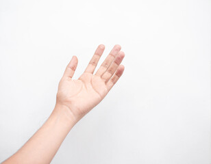 Obraz na płótnie Canvas Una mano de un joven hombre delgado con la palma abierta en un fondo blanco aislado