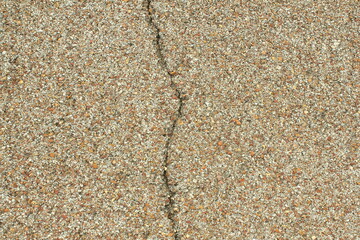 old cracked damaged asphalt parking lot,road or driveway,small stone sand texture