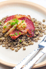 smoked meat with lentils and onion