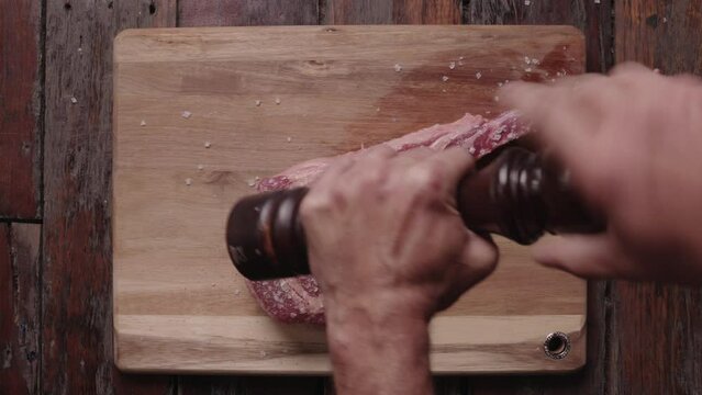 Tomahawk Steak being peppered 