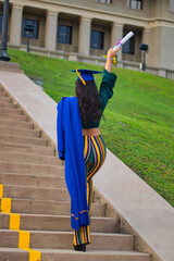 woman graduating with cap and gown