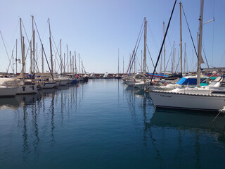 Fototapeta na wymiar yachts in a marina in Gran Canaria, image shows a beautiful clear calm marina full of yachts on a clear summers day 