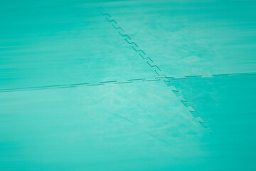 Karate tatami turquoise. Background for sports martial arts with motion blur.