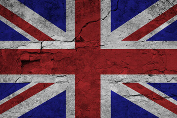 Patriotic cracked wall background in colors of national flag. United Kingdom