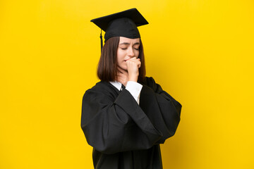 Young university graduate Ukrainian woman isolated on yellow background is suffering with cough and feeling bad