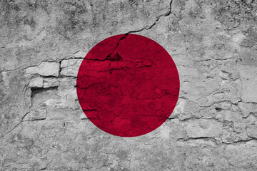 Patriotic cracked wall background in colors of national flag. Japan