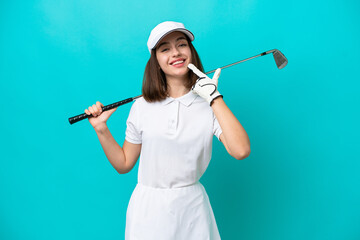 Young Ukrainian golfer player woman isolated on blue background giving a thumbs up gesture