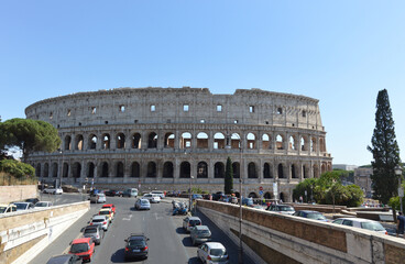 Traffic going towards the Colosseum in Rome - 509890274