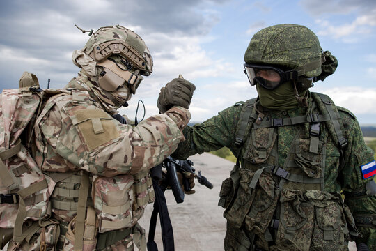 Handshake of two Russian military soldiers