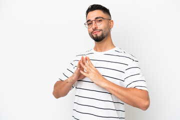 Young Arab handsome man isolated on white background scheming something