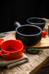 Pans of feijoada prepared on the table decorated to receive the food famous Brazilian food