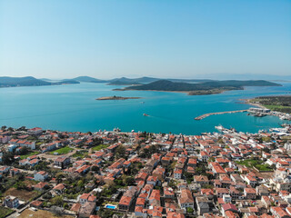 Ayvalik. Aerial view of tourist city by the sea Ayvalik in Turkey. Houses with red roofs and islands in the sea, top view