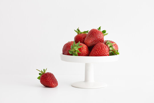 Fresh Strawberries In White Plate On White Background