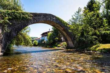 Ancient bridge over the River Nive at St Etienne de Baïgorry, French Pyrénées.