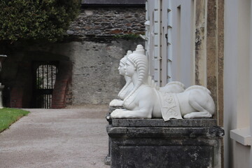 sculpture of a lion lady 
