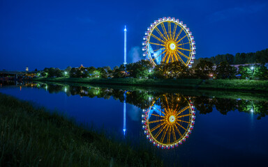 ferris wheel at night in the summer