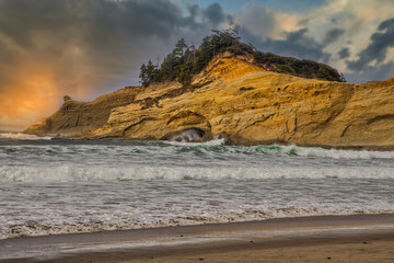 dramatic cape waves at sunset