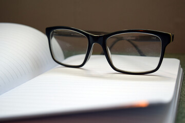 glasses on a book