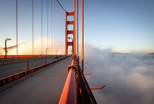 Fototapeta Fog and the Golden Gate Bridge, California.