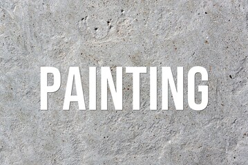 PAINTING - word on concrete background. Cement floor, wall.