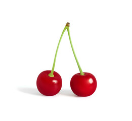 Cherry closeup isolated. Red ripe cherry on a white background.