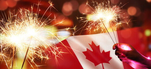 Fototapeta Collage with Canadian flag and sparklers. Canada Day celebration obraz