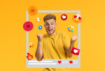 Happy young male blogger on yellow background