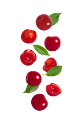 Falling cherry with green leaves isolated on a white background. Flying red berries pattern. Sliced and whole ripe cherries.