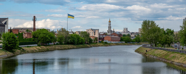 Kharkiv embankment of the Lopan River in the city center. Spring 2022. Panoramic view - obrazy, fototapety, plakaty