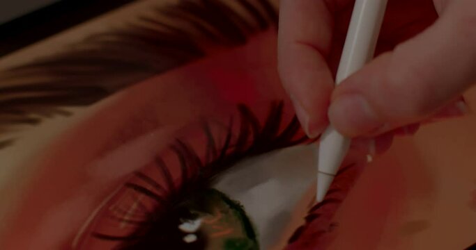 Choosing color while creating an illustration. Close-up digital paint brushes drawing elements. Push stylus onto screen, it senses heat and thus elicits reactionary response. 12.4.2022 , Prague, CZ