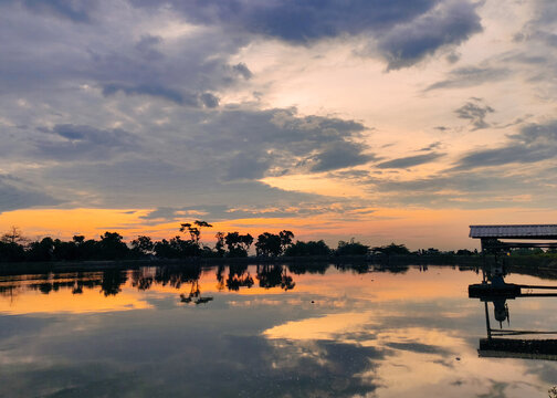 landscape photos of dusk on the river, dusk on the reservoir, photos of the evening sky.  Located in Siman Kediri Reservoir, East Java, Indonesia