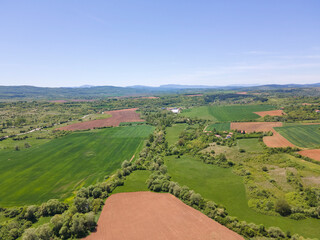Fototapeta na wymiar Aerial view of rural land near town of Godech, Bulgaria