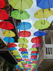 Fototapeta na wymiar colorful umbrellas on the street, cartagena Colombia umbrellas street
