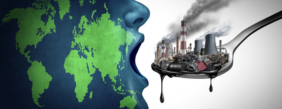 Global pollution concept with fossil fuel and industrial toxic waste as the planet earth eating petroleum and dirty polluted energy as an environmental icon