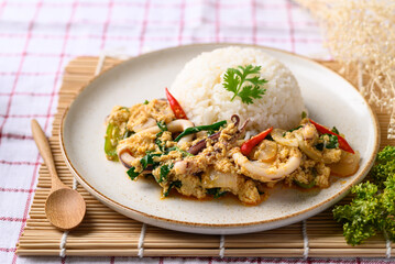 Thai stir fried curry squid and cooked rice, Thai food
