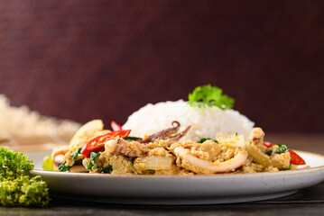 Thai stir fried curry squid and cooked rice, Thai food