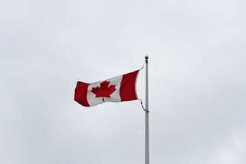canadian flag waving in the wind