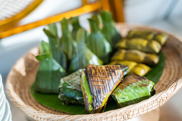 Thai dessert grilled sticky rice wrap with banana leaf