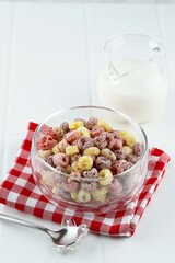 Bowl with Froot Loops Colorful Cereal. Kids Breakfast Concept