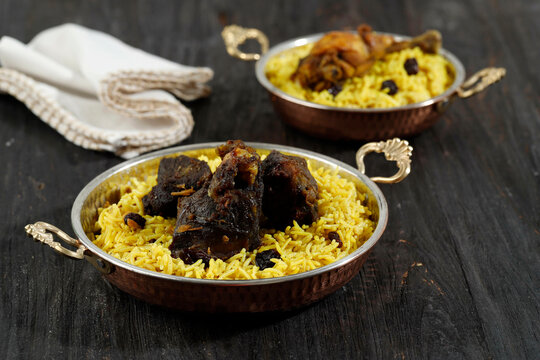 Mutton Biryani Spicy Indian Malabar Hyderabadi or Dum Biriyani Pulao from Kerala India Sri Lanka Pakistan. Basmati Rice Mixed Rice Dish Lamb Meat Curry