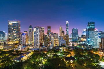 Fototapeta na wymiar buildings cityscape near Witthayu road at night in Bangkok city, Thailand