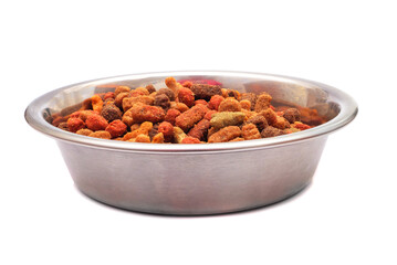 Pet dry food in metal bowl isolated on white background