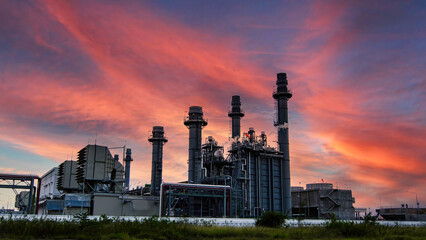 Fototapeta na wymiar Oil refinery industry factory, petrochemical plant at sunset